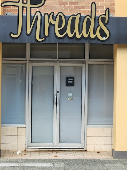 Threads Boutique op shop